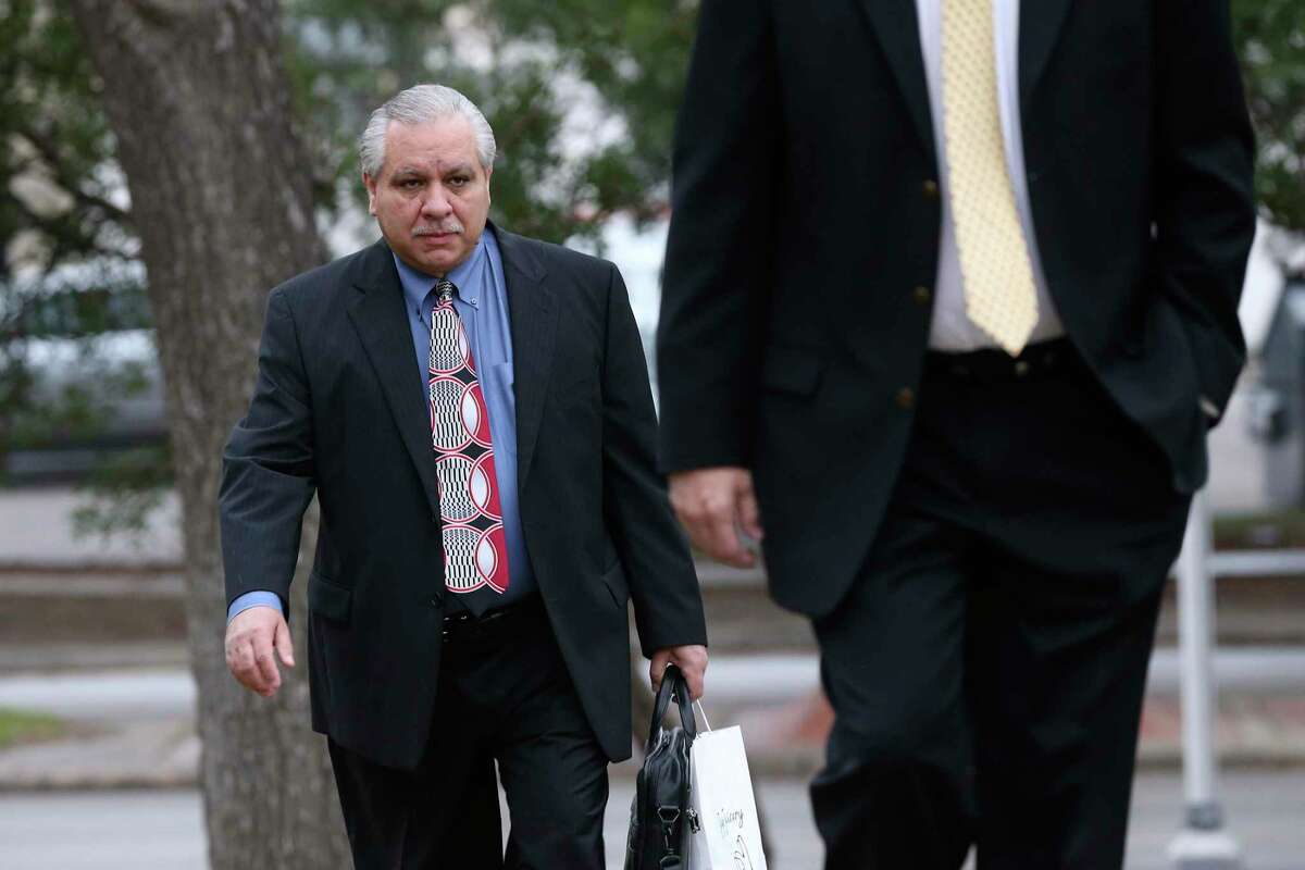 Gary Cain arrives at the John H. Wood Jr. United States Courthouse for closing arguments in his criminal fraud trial in 2018. Cain was convicted of nine felonies and sentenced to 68 months in prison. He has asked a judge to release him from prison, citing his declining health.