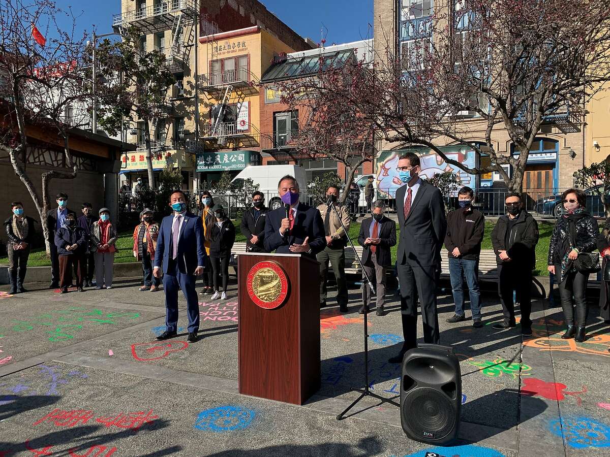 A group of elected officials and Asian American community leaders gathers in Portsmouth Square, at the heart of San Francisco's Chinatown neighborhood, to denounce recent attacks against people of Asian descent.
