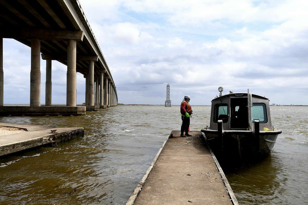A rental boat docks temporarily at the boat ramp at Mesquite Point that was damaged during Tropical Storm Harvey. Jefferson County is moving forward with plans to repair the ramp using a grant from Texas Parks and Wildlife. Photo made Monday, March 22, 2021 Kim Brent/The Enterprise