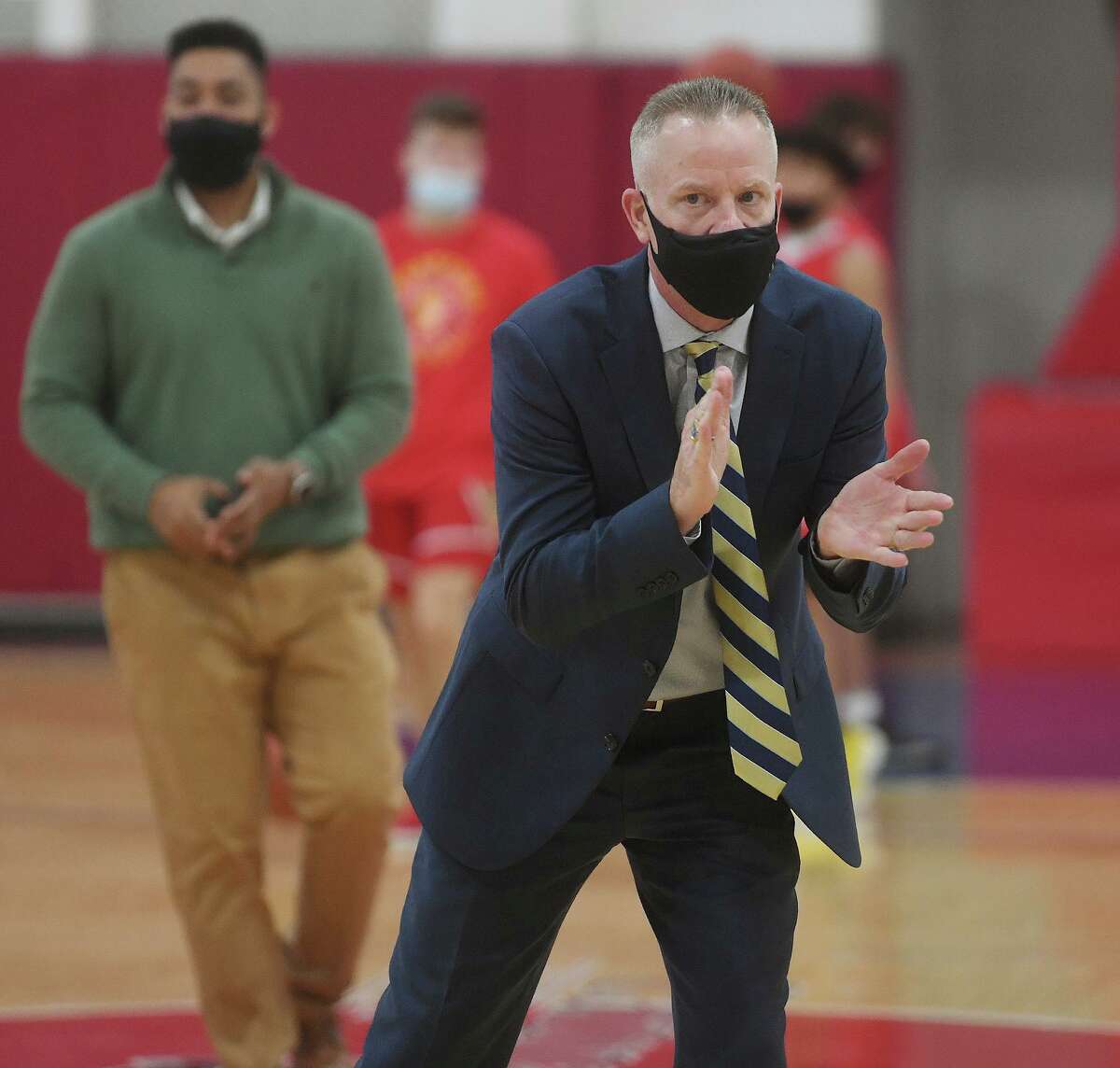 Kolbe Cathedral Coach John Pfohl leads his team against Stratford in the SWC tournament semifinals at the Cardinal Sheehan Center in Bridgeport, Conn. on Monday, March 22, 2021.