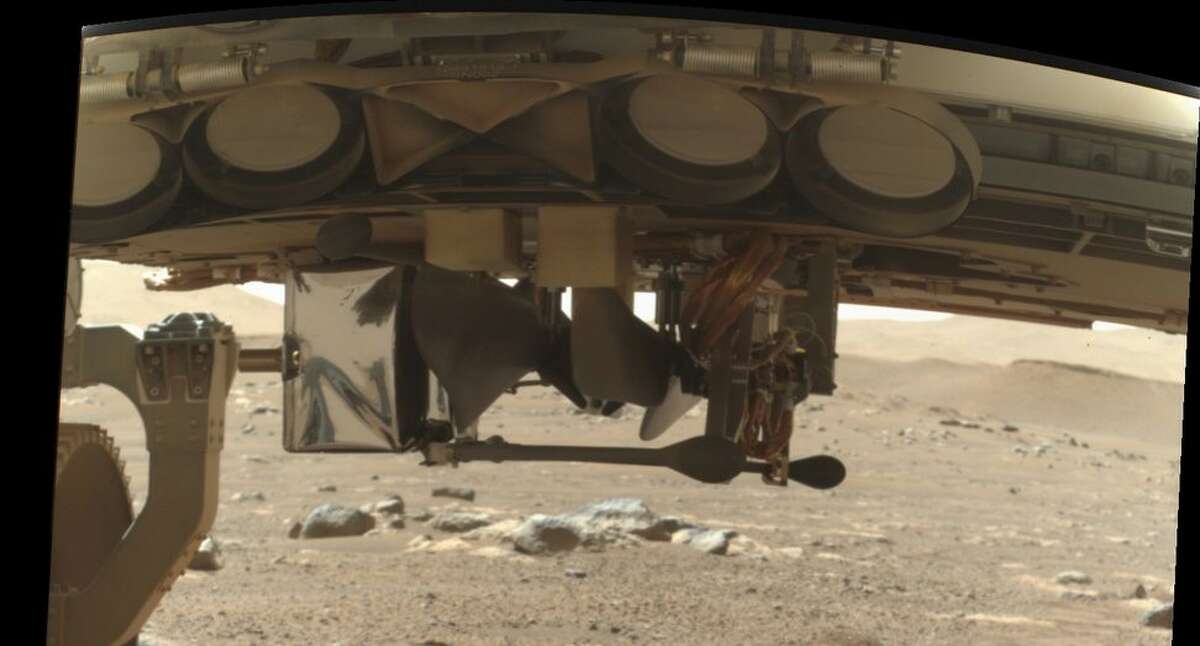 NASA's Perseverance Mars Rover shares first look at the Helicopter Ingenuity ready to take its test flight in April.