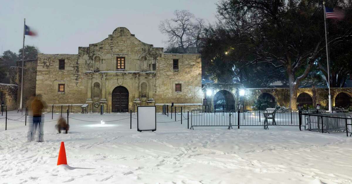 The Alamo is seen early Monday morning, Feb. 15, 2021 behind a layer of snow. The National Weather Service reported Tuesday morning that San Antonio and surrounding areas saw 3-5 inches of snow and some pockets of the forecast area saw 6-7 inches of snow. The Electric Reliability Council of Texas (ERCOT) has also declared the highest level of energy emergency and is requiring rolling blackouts throughout Texas. The National Weather Service reports the areas temperatures are the coldest since 1989.