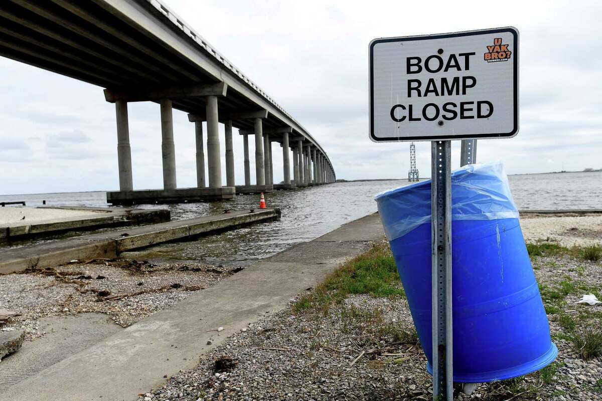 Signage indicates closure of the boat ramp at Mesquite Point, which was damaged during Tropical Storm Harvey. Jefferson County is moving forward with plans to repair the ramp using a grant from Texas Parks and Wildlife. Photo made Monday, March 22, 2021 Kim Brent/The Enterprise