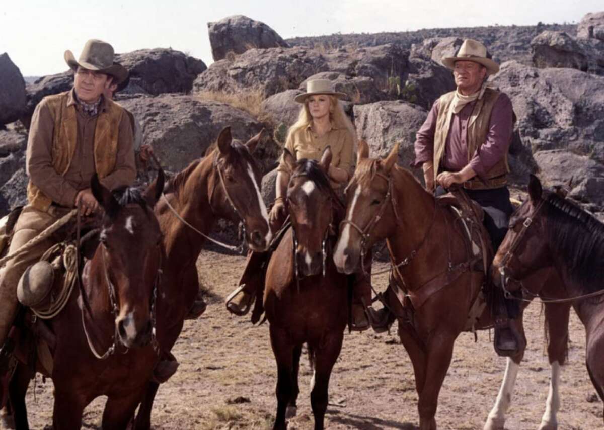#100. The Train Robbers (1973) - Director: Burt Kennedy - Metascore: 64 - Runtime: 92 minutes John Wayne plays a Union Army veteran who signs on to help a train robber’s widow, played by Ann-Margret, find a stash of gold hidden by her late husband. Director Burt Kennedy also wrote the movie, which is action-filled with an unexpected ending.