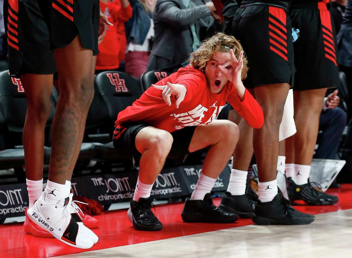 Houston Cougars guard Landon Goesling (2) celebrates on the bench after a three point shot during the second half of the NCAA basketball game between the Houston Cougars and the LSU Tigers at the Fertitta Center in Houston, TX on Wednesday, December 12, 2018. Houston defeated LSU 82-76.