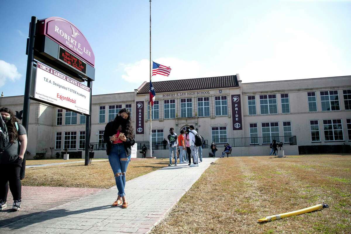 Students leave Friday, Feb. 26, 2021, at Robert E. Lee High School in Baytown.
