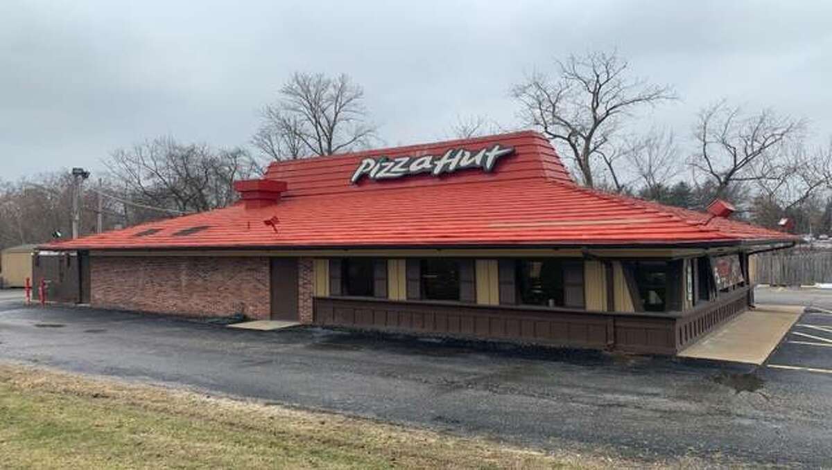 This file photo shows the Pizza Hut in Godfrey that was closed in September along with several other Riverbend Pizza Hut restaurants. On Wednesday, the Flynn Restaurant Group announced it had acquired Pizza Hut restaurants in Alton, Granite City and Collinsville.