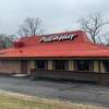 This file photo shows the Pizza Hut in Godfrey that was closed in September along with several other Riverbend Pizza Hut restaurants. On Wednesday, the Flynn Restaurant Group announced it had acquired Pizza Hut restaurants in Alton, Granite City and Collinsville.