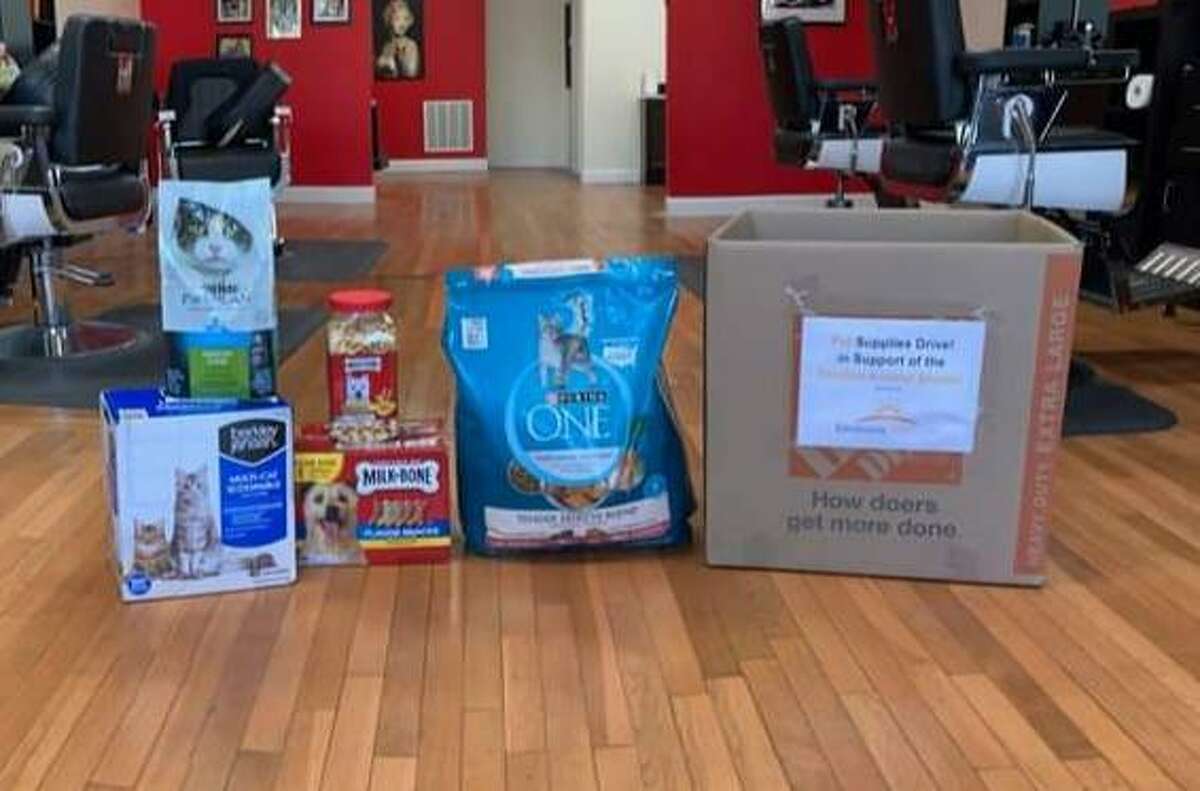 Envision Shelton is collecting donations for the Shelton Animal Shelter. Collection boxes are located at Bruegger's Bagels, 817 Bridgeport Ave., and Moderno Barbershop, 194 Leavenworth Road, pictured above.