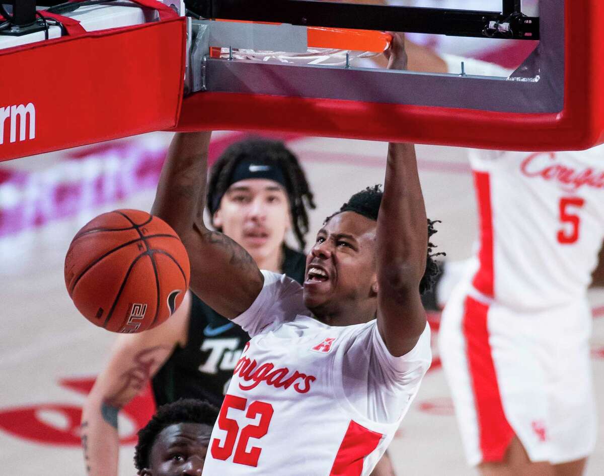 UH freshman center Kiyron Powell (52) has done most of his developing in practice this season, although he did see three minutes of action in the Cougars’ first-round NCAA Tournament blowout of Cleveland State.