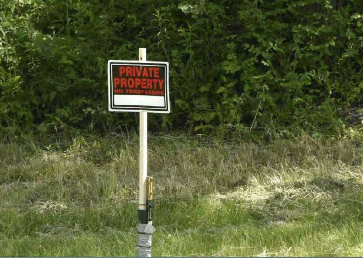 A No Trespassing sign is seen on part of the nearly 30 acre parcel of forest land near Siena College in Loudonville. The land has become the center of a court dispute between descendants of a wealthy family with local ties and one of the several Audubon Societies that exist.