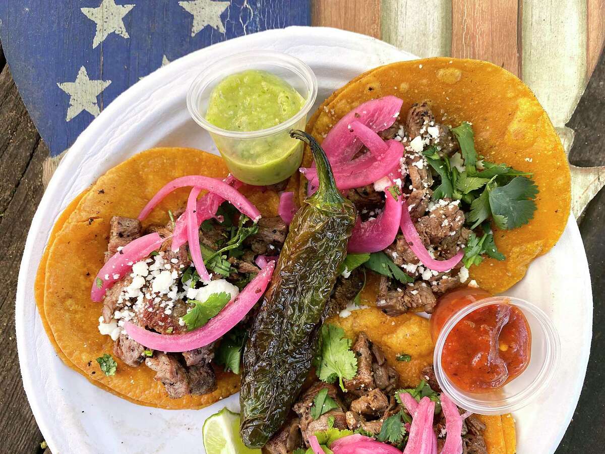 Carne asada tacos come three to an order at Milpa, a food trailer from chef Jesse Kuykendall that specializes in tacos, pozole and quesadillas.
