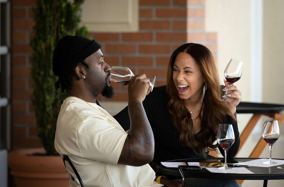 Arin DeLoatch and Kiara Fischer taste wine at Domaine Carneros, one of the entries on our Top 25 Wineries to Visit list.