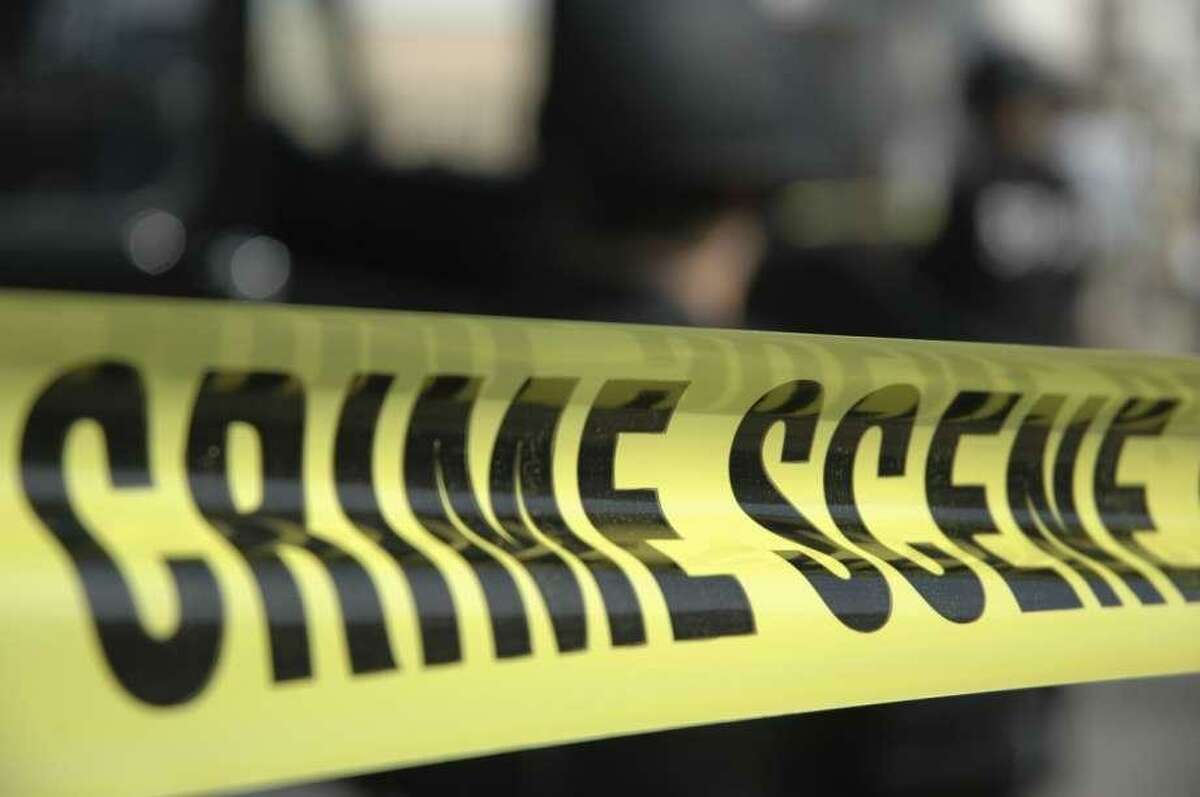 Crime scene tape. A 13-year-old boy was killed Wednesday in an exchange of gunfire between two groups of people on a tree-lined street in East San Jose, police said.