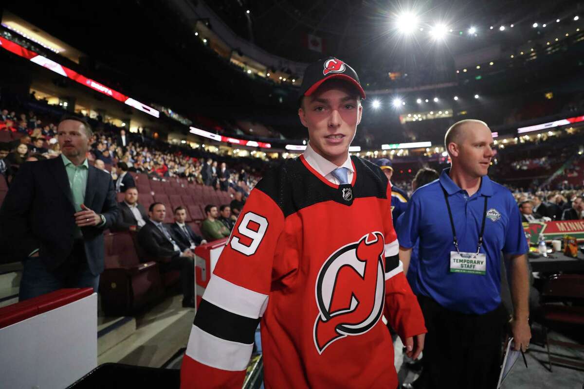 VANCOUVER, BRITISH COLUMBIA - JUNE 22: Tyce Thompson reacts after being selected 96th overall by the New Jersey Devils during the 2019 NHL Draft at Rogers Arena on June 22, 2019 in Vancouver, Canada. (Photo by Bruce Bennett/Getty Images)