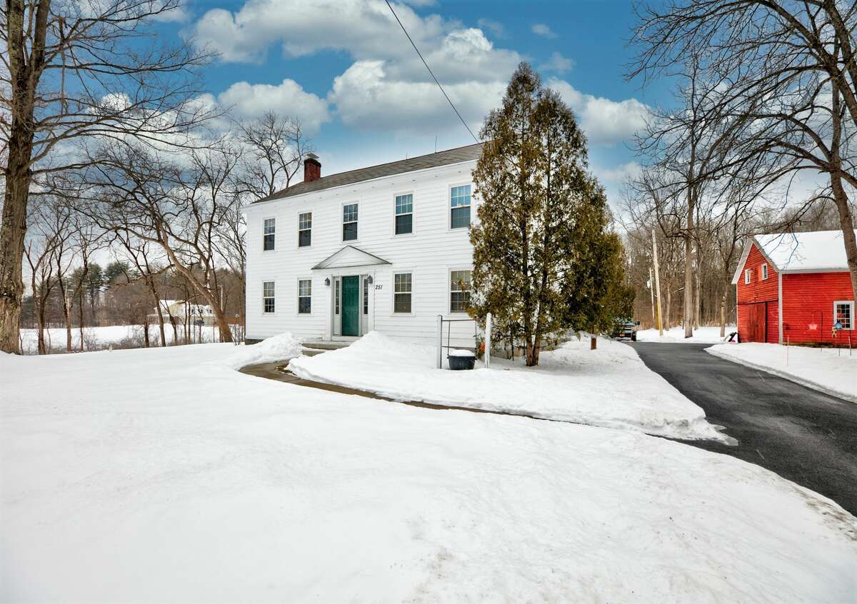 This house was built as a tavern 230 years ago, but has mostly been a family home throughout its long history. The style is Colonial, and the setting is agricultural. The property is five acres and includes two barns. Changes over the years have added space, a three-season room, a kitchen with quartz counters and updated bathrooms, but the two fireplaces, plank floors and doors made with mortise and tenon joints are still there. The house has two and a half bathrooms and four bedrooms. Natural gas heat, private septic and well. South Glens Falls schools. Taxes: $5,710. List price: $378,000. Contact listing agent Scott Varley at Keller Williams Capital District at 518-281-6808.  https://realestate.timesunion.com/listings/251-Gansevoort-Rd-Moreau-NY-12831-MLS-202112478/49445051