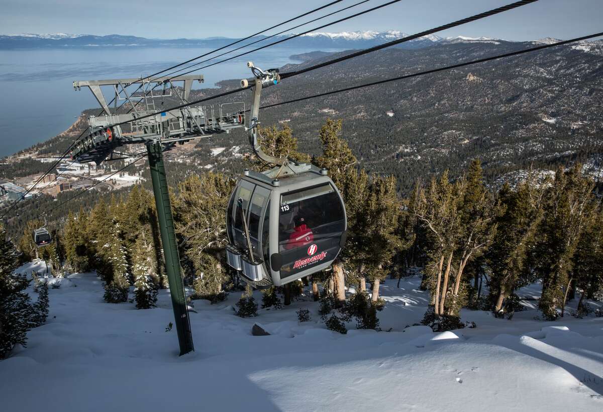 Skiers head up the gondola at Heavenly Mountain ski resort in 2018, in South Lake Tahoe, Calif. Season passes to ski at Heavenly are currently on sale for their cheapest prices of the year.