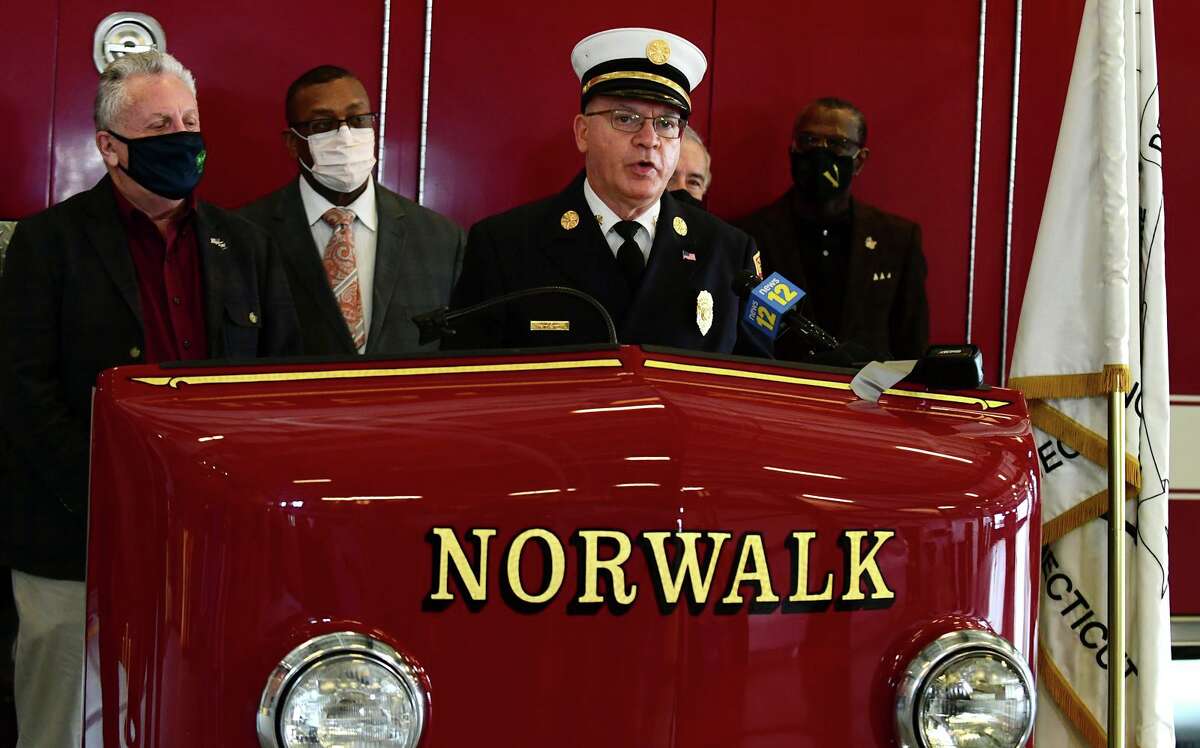 Norwalk Fire Chief Gino Gatto, Norwalk Mayor Harry Rilling, members of the Board of Fire Commissioners, local clergy, and community leaders announce a recruitment period and testing process for entry-level firefighters during a news conference at the fire department headquarters in Norwalk on Thursday.