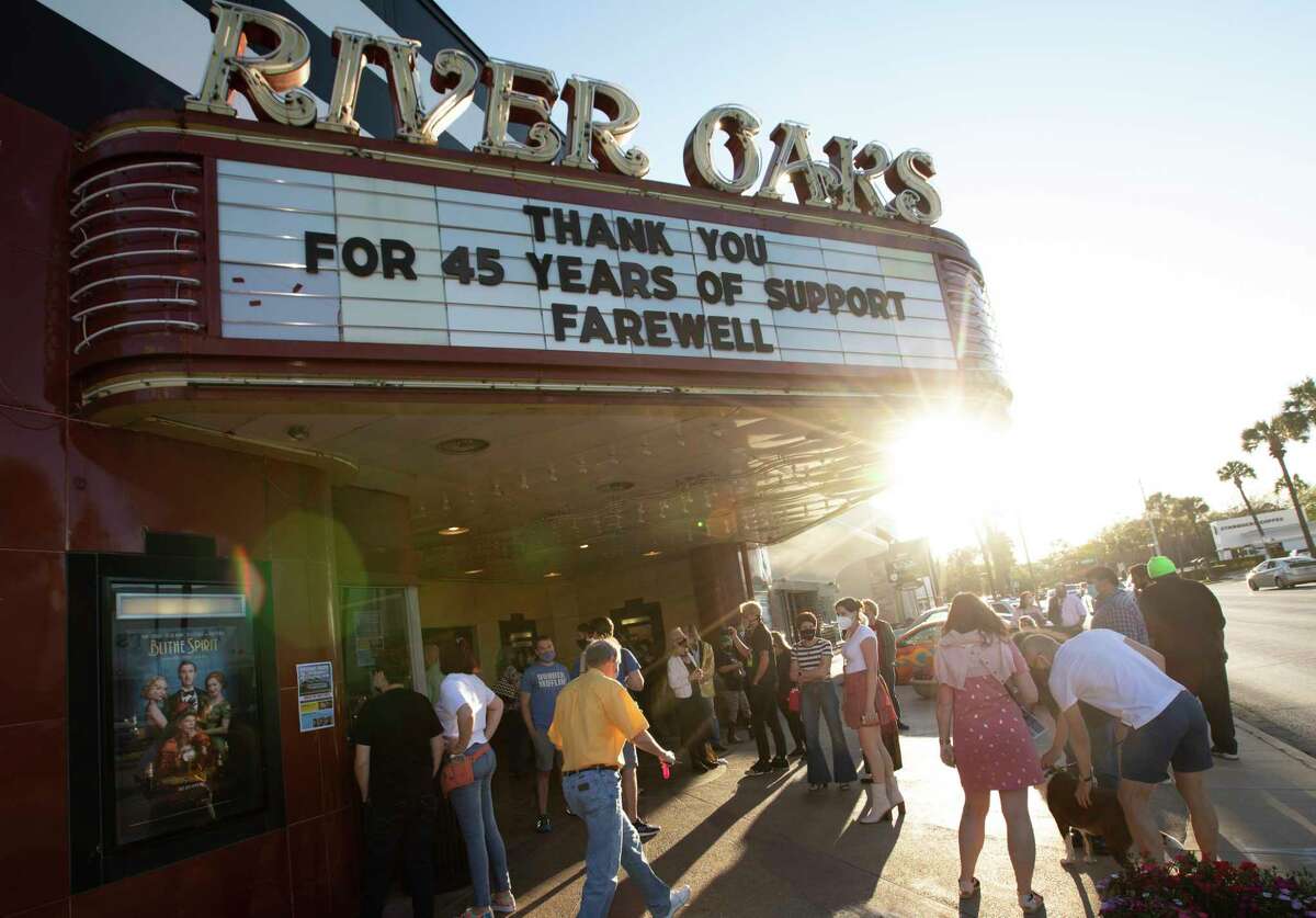 People gather at River Oaks Theatre on the final day of showing films Thursday, March 25, 2021, in Houston.