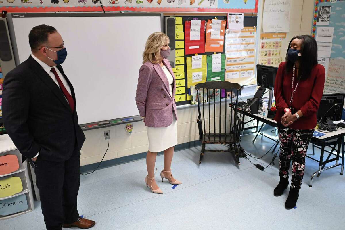 US First Lady Jill Biden and Education Secretary Miguel Cardona visit a classroom as they tour Benjamin Franklin Elementary School in Meriden, Connecticut, on March 3, 2021. (Photo by MANDEL NGAN / POOL / AFP) (Photo by MANDEL NGAN/POOL/AFP via Getty Images)