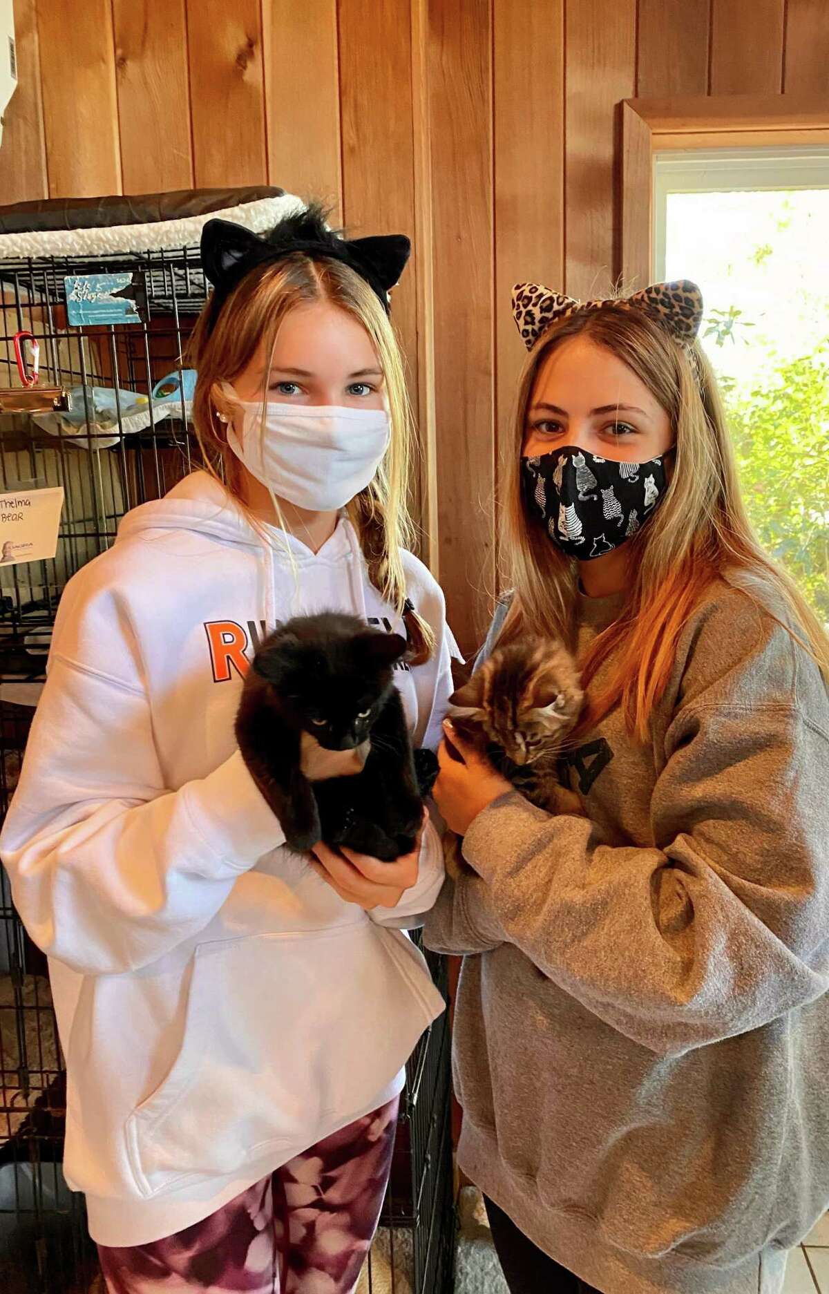Callie Thompson and Grace Hooker, two Ridgefield High School sophomores, are members of the new junior advisory board at Rock N’ Rescue, a nonprofit animal rescue organization in South Salem, N.Y.