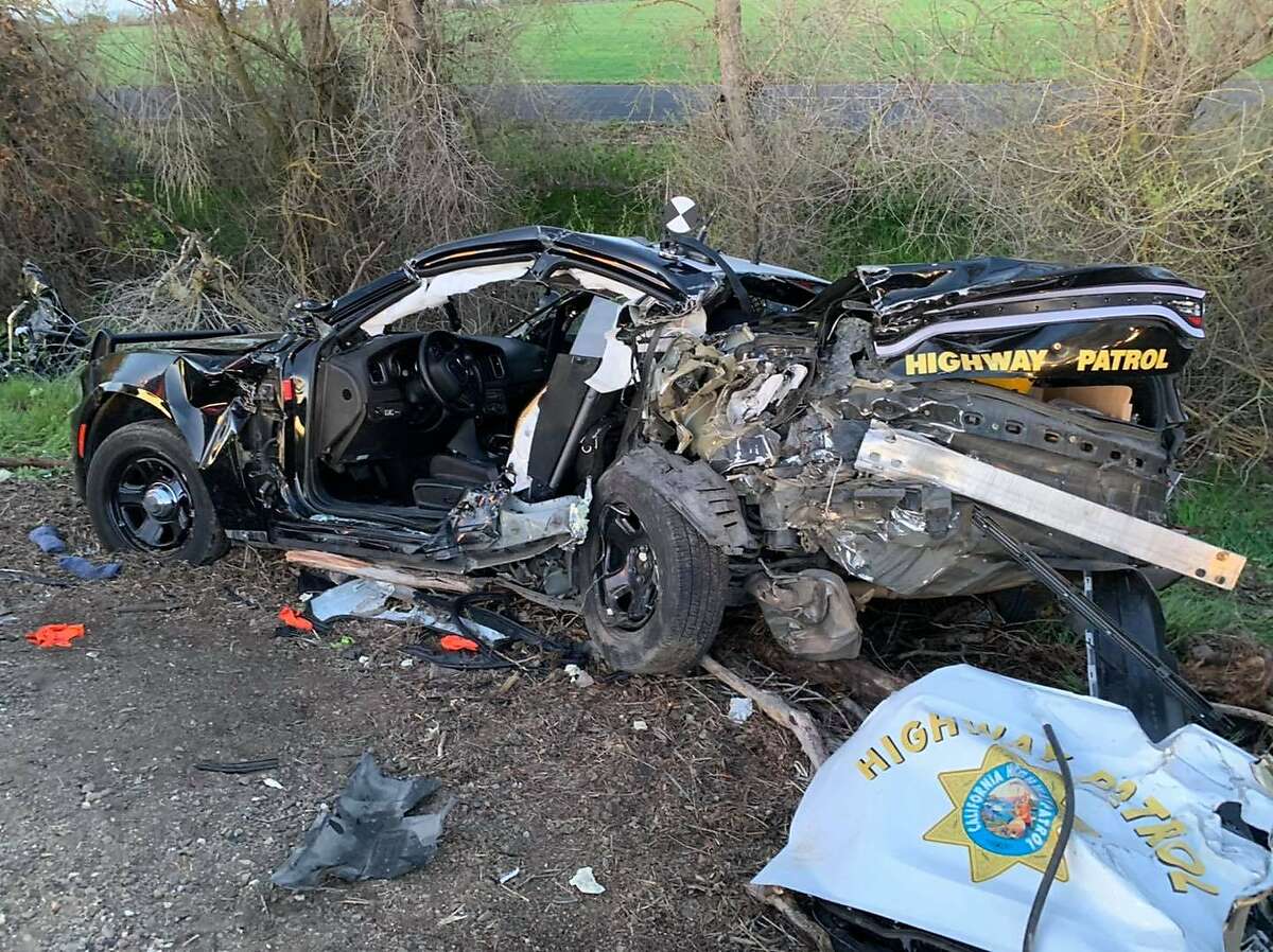 This CHP vehicle had been stopped at the side of the road when it was struck by an SUV whose three occupants died in the fiery crash near Lodi.