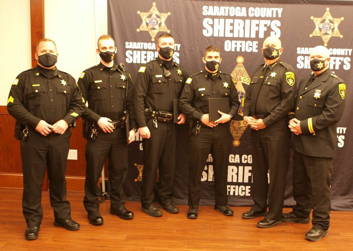 On March 12 at about 3:30 a.m. members of the Saratoga County Sheriff's Office responded to an EMS assist call from a resident in Wilton. It was reported that a 50-year-old man on Northern Pines Road was unconscious and not breathing. Upon arrival deputies immediately began providing continuous CPR and deployed an AED (Automated external defibrillator) delivering two shocks. The man regained a pulse and was transported to the hospital for treatment.He received medical treatment and has since been released and returned home. On March 26, Sheriff Michael Zurlo presented the Life Saving Award to Deputies Kyle Basta, Jared Gardner, and Samuel Speziale who through their prompt action saved the man's life. The three deputies will be formally recognized at an awards ceremony which will be held later in 2021. The Sheriff's Office was assisted by the following agencies: Wilton Emergency Squad, Wilton Fire Department.