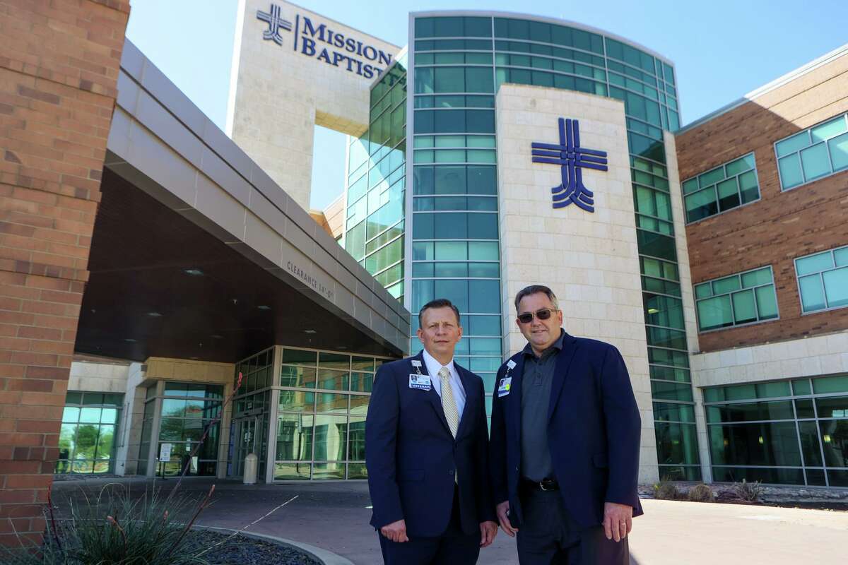 Matt Stone, CEO of Baptist Health System, left, and Michael Cline, President and CEO of Mission Trail Baptist Hospital, stand outside Mission Trail Baptist Hospital on Thursday, March 25, 2021. The Baptist Health System announced plans to expand and upgrade its women’s services, including adding labor and delivery services and converting the current ortho floor to OB care.