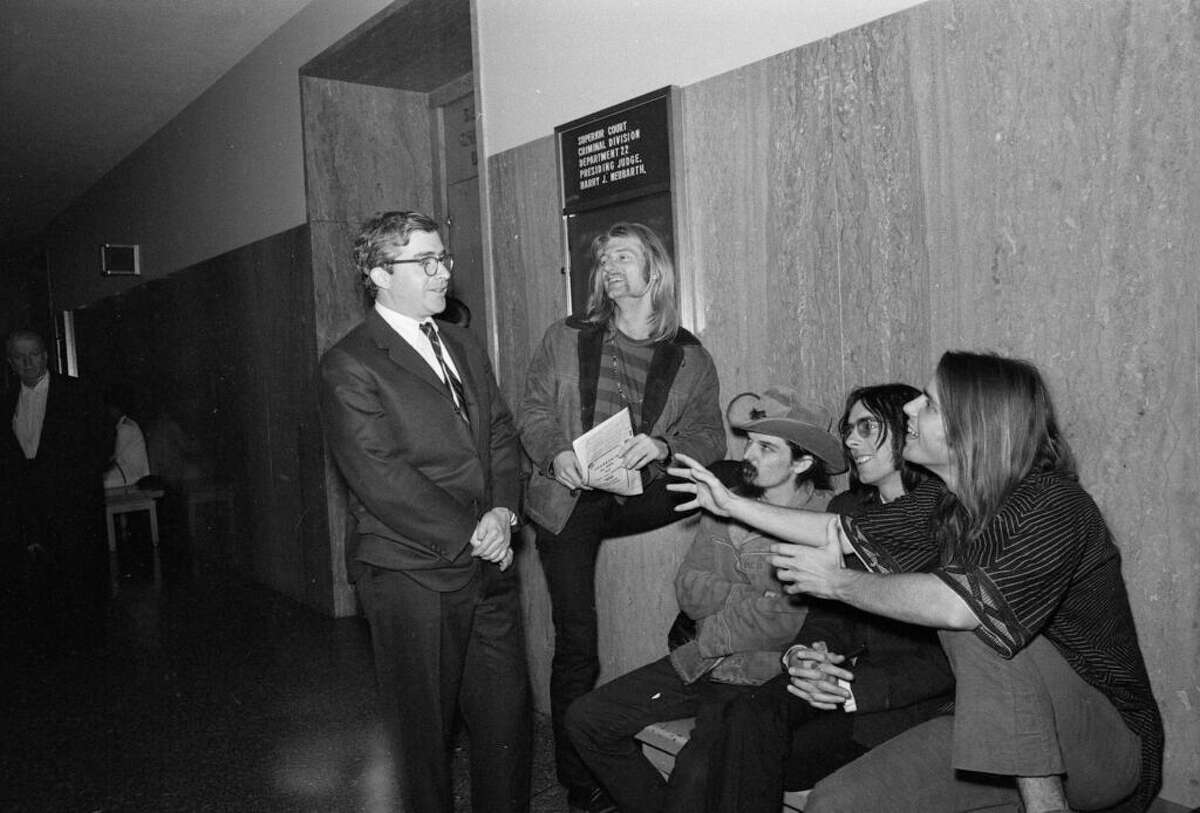 Attorney Brian Rohan, left, chats with the Grateful Dead on June 23, 1968 at their sentencing in San Francisco Superior Court for possession of marijuana.