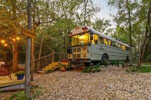 The Hill Country's coziest Airbnb is a school bus in the woods
