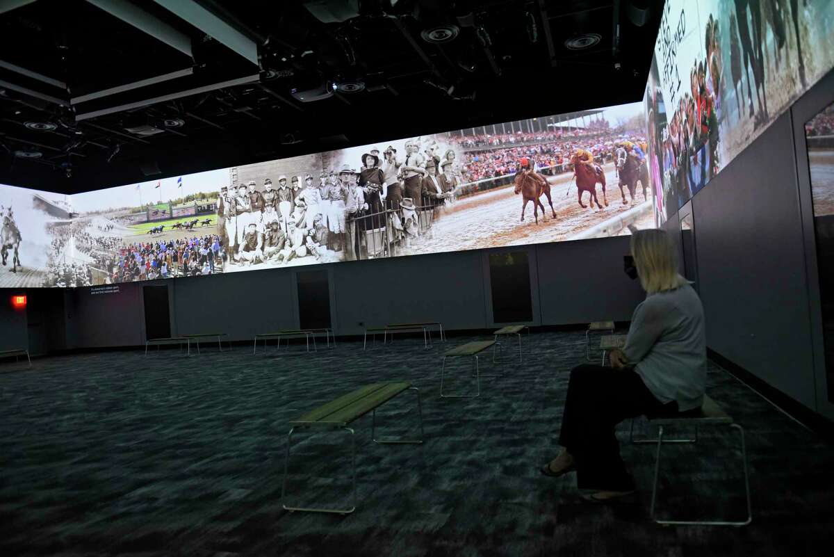 “What it Takes” a 16 minute film is projected on multiple screens in the Hall of Fame room in the National Museum of Racing on Friday, March 26, 2021 in Saratoga Springs, N.Y. The museum recently underwent a multi-million renovation. (Lori Van Buren/Times Union)