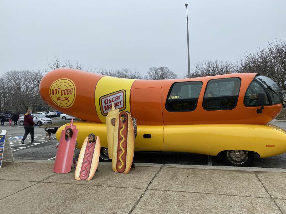 The Oscar Mayer Wienermobile and the Planters NUTmobile, a legume-shaped vehicle, stopped at the Groton Municipal Building on March 26.