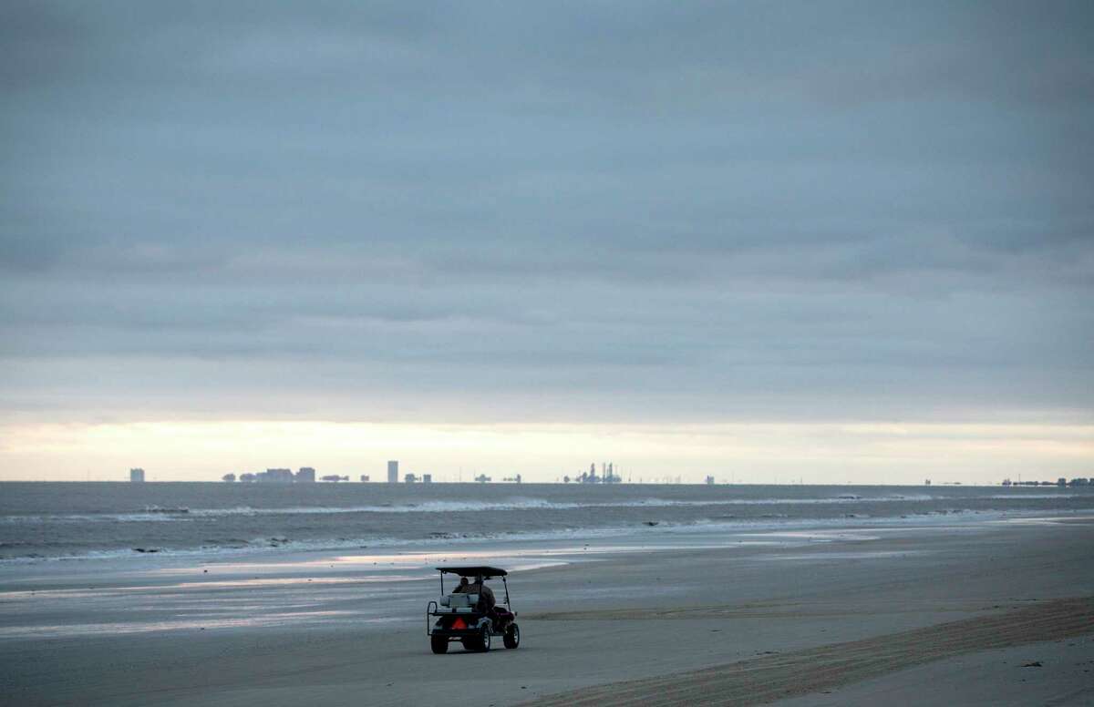 Harry Monceaux and his wife Charlotte Monceaux drive home on the beach, Friday, Dec. 14, 2018, in Crystal Beach. The couple recently bought a piece of property that will be behind the current location of the proposed Ike Dike.