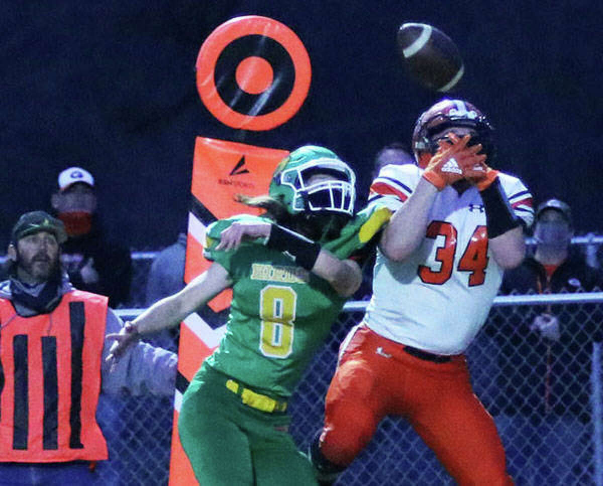 Southwestern’s Sam Robinson (8) breaks up a pass intended for Gillespie’s John Berry in the second half of the Piasa Birds’ 34-24 victory Friday night at Knapp Field in Piasa.