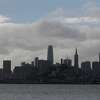 The San Francisco skyline is covered in a mixture of sun and clouds after a storm passed through on March 15, 2021 in San Francisco, California.