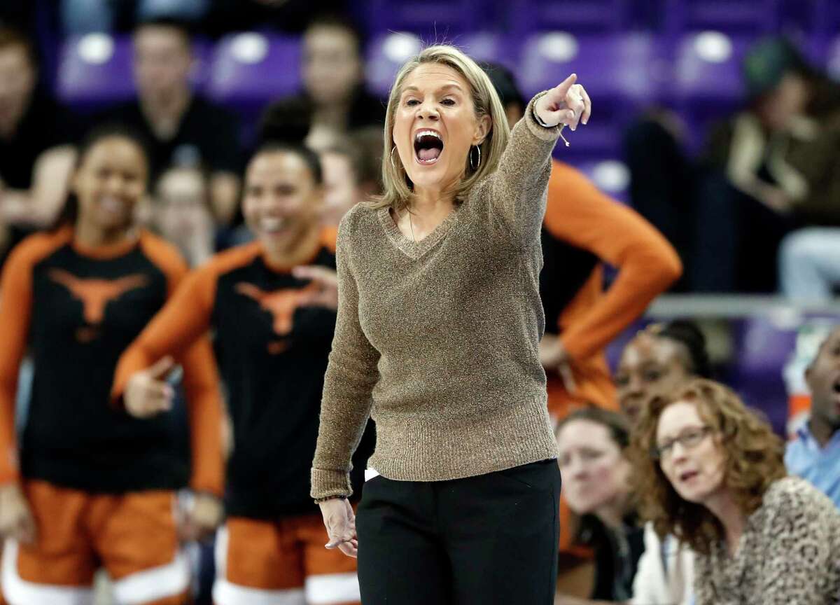 File - In this March 5, 2019, file photo, Texas coach Karen Aston gestures to her team during the second half of an NCAA college basketball game against TCU in Fort Worth, Texas. Texas, ranked No. 23 in the final AP poll, is making its sixth overall tournament appearance. The Longhorns fell to Iowa State 75-69 in the Big 12 tournament semifinals. "You have to re-set, it's a new season. You can either pout about what happened, and pout about what didn't go right, or you can re-set your batteries and you can move forward," Aston said. (AP Photo/Tony Gutierrez, File)