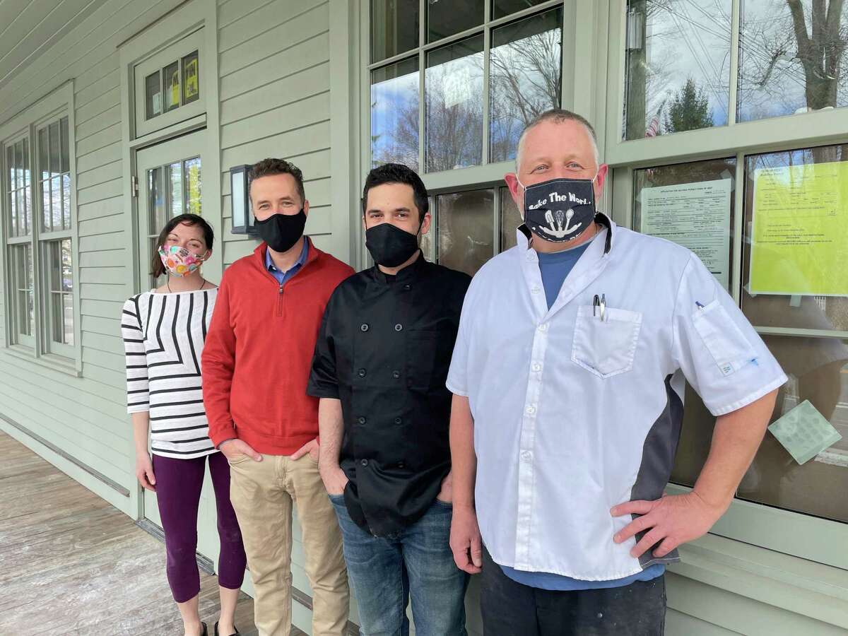 In front of the future home of Wilson's by High Watch, which is currently under construction at Kent Barns. From left, Laura Levine, pastry chef; Brendan Miller, vice president of operations at High Watch; Chris Lawrence, executive chef at High Watch; and Bruce Young, baker.