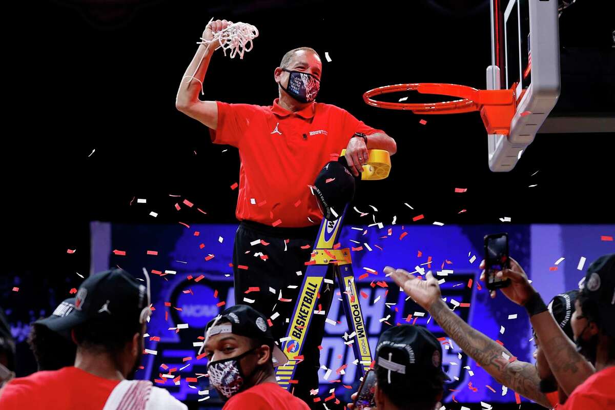 Head coach Kelvin Sampson of the Houston Cougars cuts the net after defeating the Oregon State Beavers in the Elite Eight round of the 2021 NCAA Men’s Basketball Tournament at Lucas Oil Stadium on March 29, 2021 in Indianapolis, Indiana.
