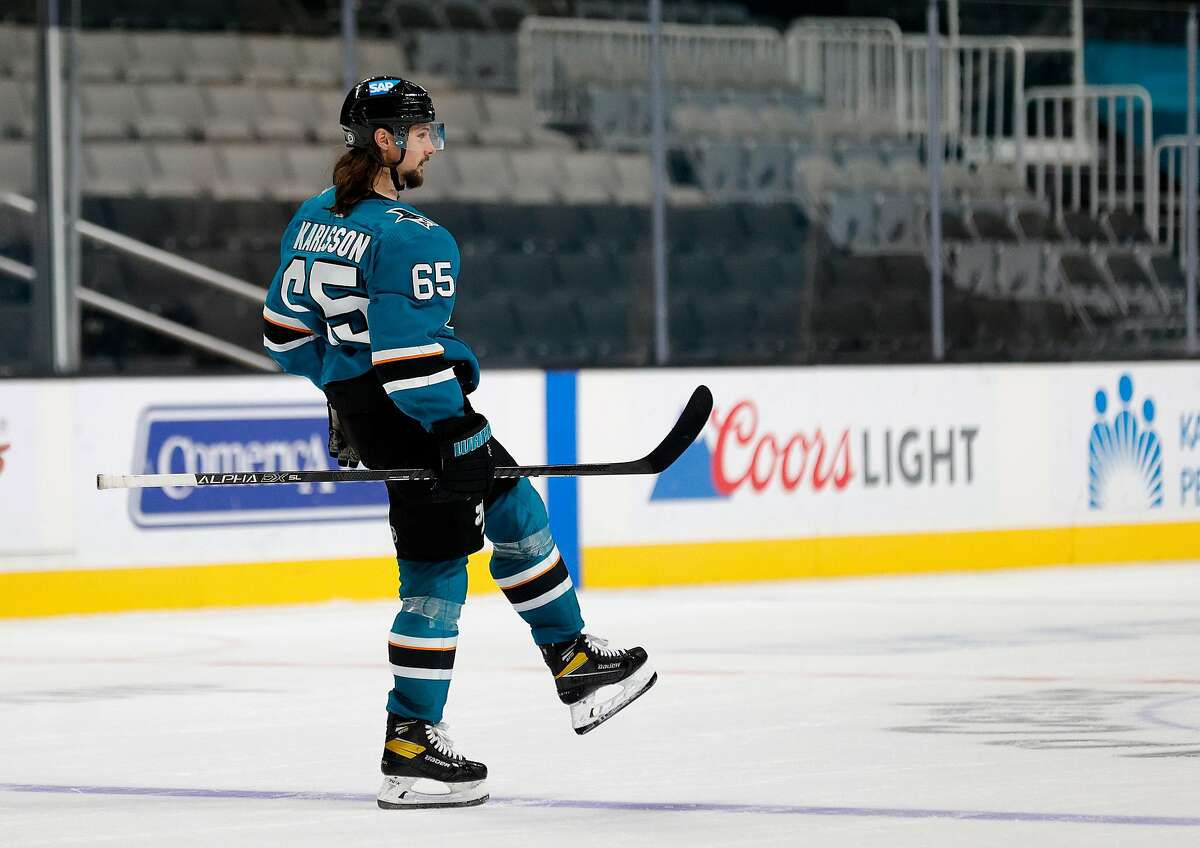 SAN JOSE, CALIFORNIA - MARCH 29: Erik Karlsson #65 of the San Jose Sharks celebrates after he scored the winning goal against the Minnesota Wild in a shootout at SAP Center on March 29, 2021 in San Jose, California. (Photo by Ezra Shaw/Getty Images)