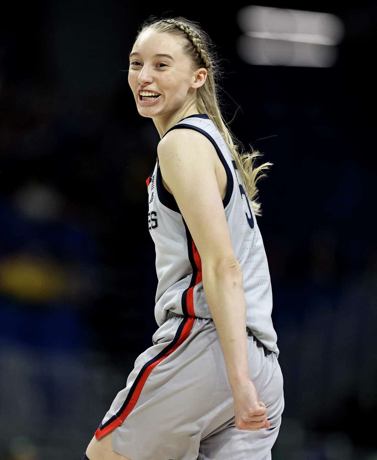 SAN ANTONIO, TEXAS - MARCH 29: Paige Bueckers #5 of the UConn Huskies celebrates her shot late in the fourth quarter against the Baylor Lady Bears during the Elite Eight round of the NCAA Women's Basketball Tournament at the Alamodome on March 29, 2021 in San Antonio, Texas.The UConn Huskies defeated the Baylor Lady Bears 69-67 to advance to the Final Four. (Photo by Elsa/Getty Images)