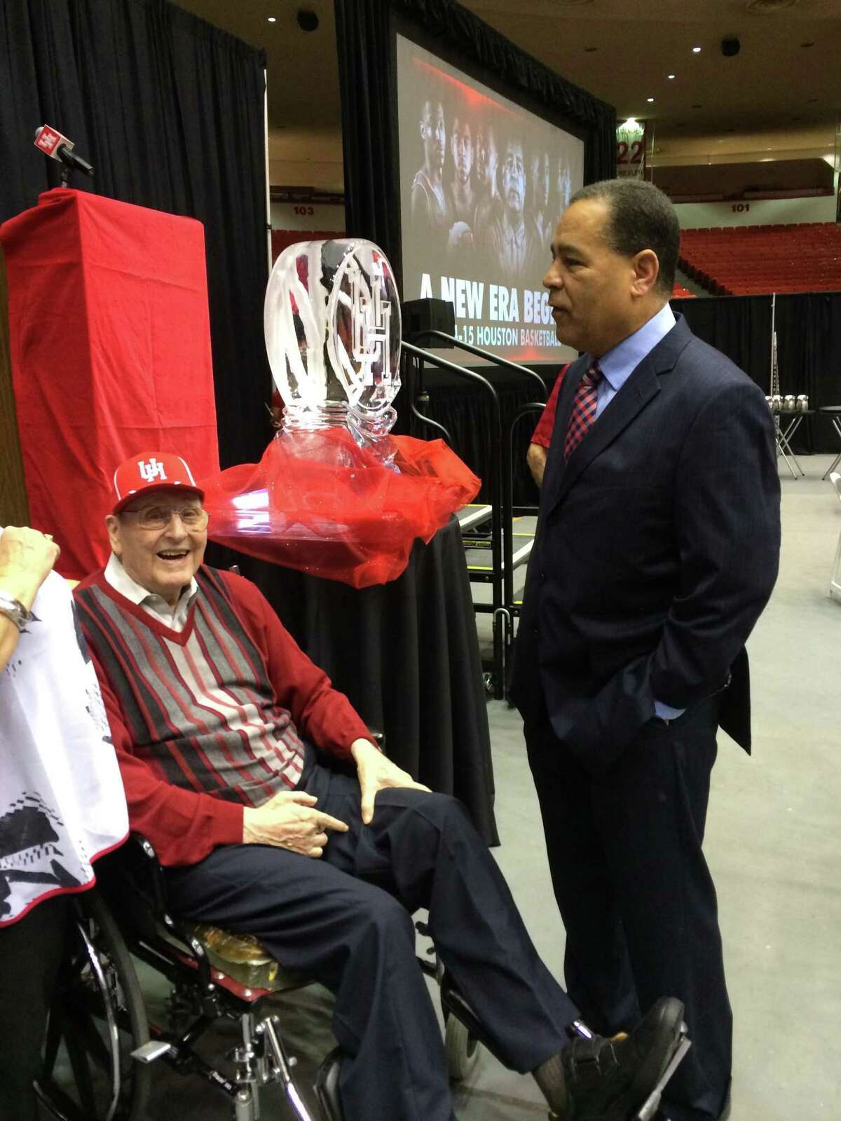 After being hired in 2014, Kelvin Sampson speaks with coach Guy V. Lewis.