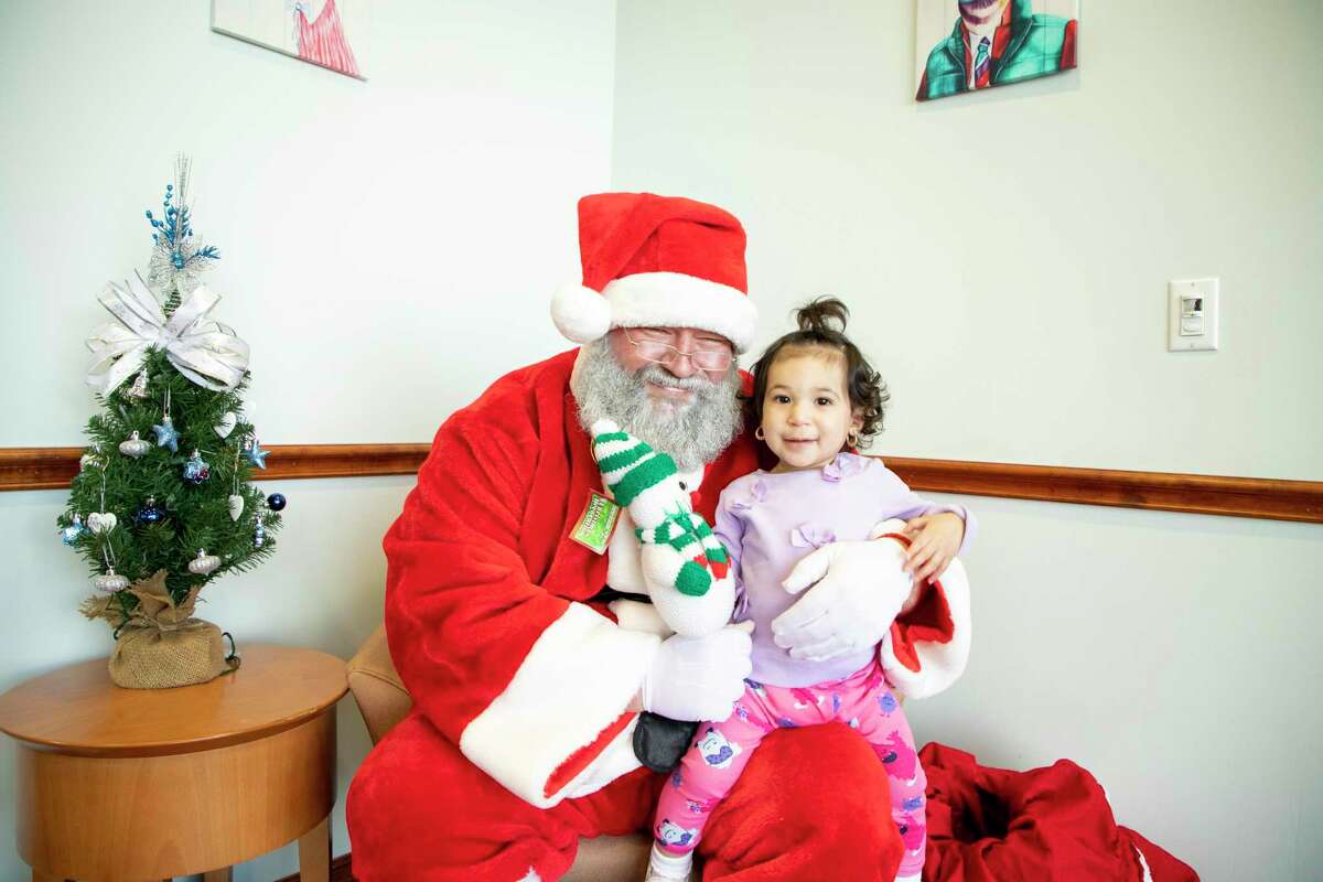 Will McWhorter started volunteering around town as Santa Claus for Christmas celebrations when he was 16. He loves providing children with a sense of magic around the holidays - and besides, the suit fits. Or, it did.
