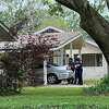 Police were at the home of a former Lamar University employee who was taken into custody Monday night. Police say they found weapons and ammunition in the suspect's vehicle.