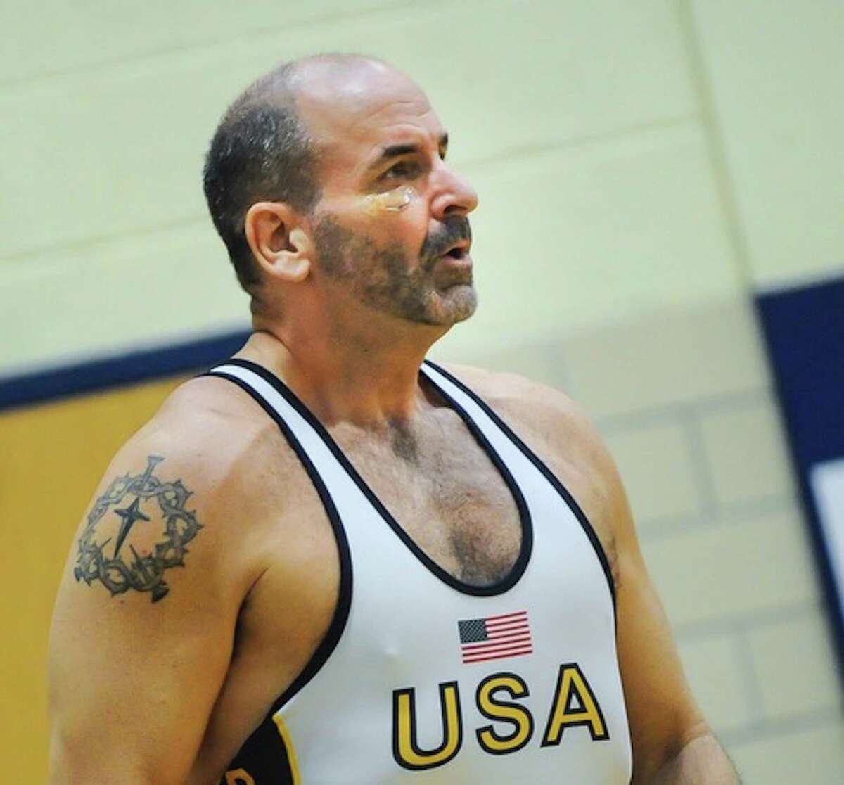 Ridgefield resident Mark Dollins, 60, will return to the USA Wrestling Folkstyle Championships this weekend in the hopes of claiming his third national title.
