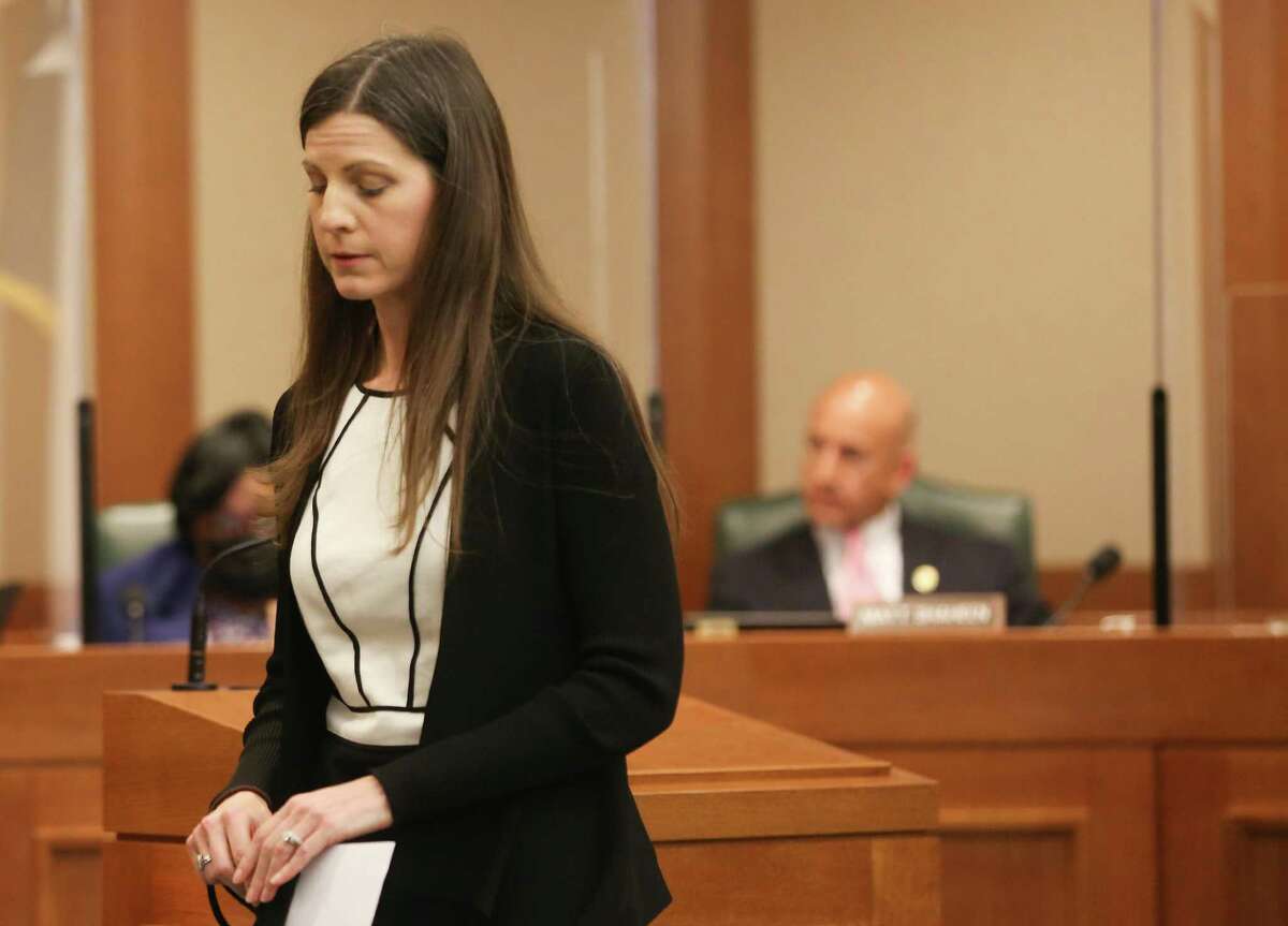 Ann Marie Timmerman walks away from the podium after giving her statement during Human Services committee of the Texas House hearing for HB3820 in Austin on Tuesday, March 30, 2021. Timmerman was featured in the Houston Chronicle's "Do No Harm" investigation on CPS, which the bill HB3820 is a result of.