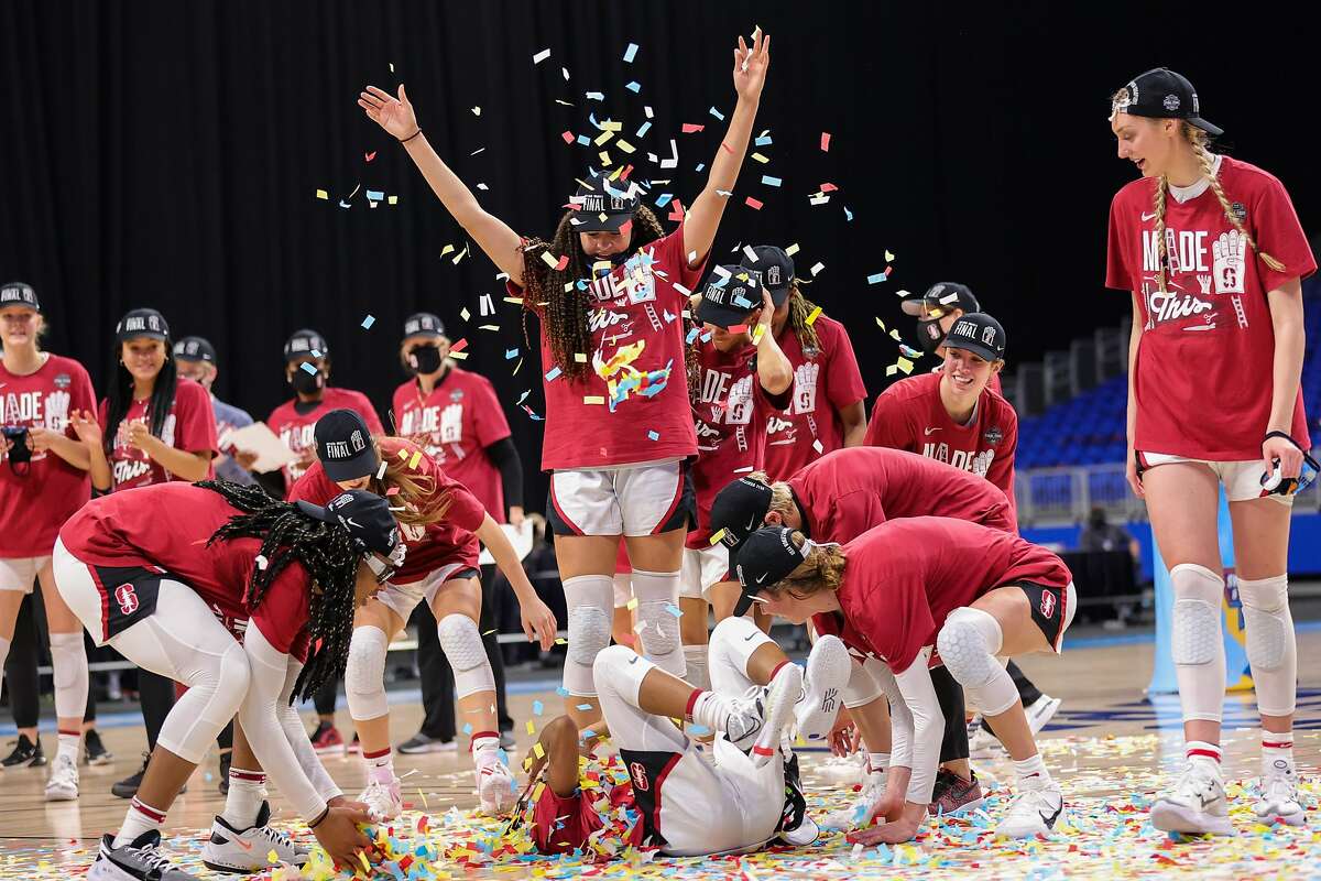 SAN ANTONIO, TEXAS - MARCH 30: The Stanford Cardinal celebrate their win over the Louisville Cardinals in the Elite Eight round of the NCAA Women's Basketball Tournament at the Alamodome on March 30, 2021 in San Antonio, Texas. (Photo by Carmen Mandato/Getty Images)