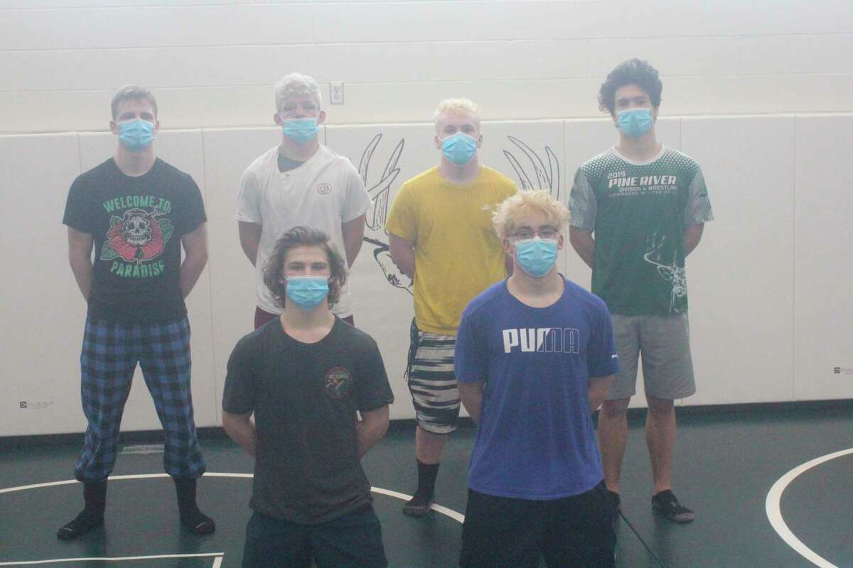 Pine River wrestlers going to the state meet on Saturday are: front, from left, Gavyn Nelson and Cameron Helmboldt; back, from left, Andrew Stevens, Cayden Mys, Elijah Carper and Phil Rigling. (Pioneer photo/John Raffel)