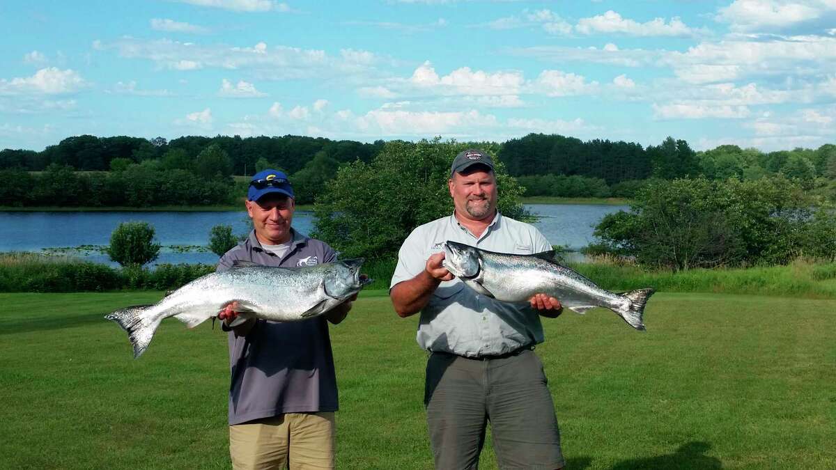Evart's Mark Sochocki (left) is an active angler and hunter. (Courtesy photo)
