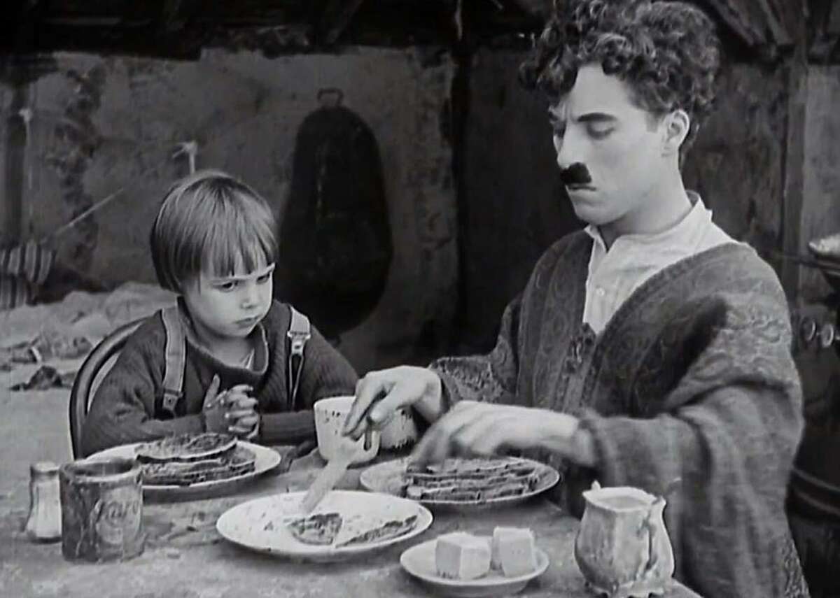 1921: The Kid - Director: Charles Chaplin - IMDb user rating: 8.3 - Votes: 114,516 - Runtime: 68 minutes Charlie Chaplin was perhaps the biggest star of the silent movie era, and “The Kid” remains one of his most iconic works. It centers on Charlie the Tramp, who takes an orphan under his wing and then must fight to keep him. According to legend, the on-screen dynamic between Chaplin and the orphan was directly inspired by the recent death of Chaplin’s own infant son.