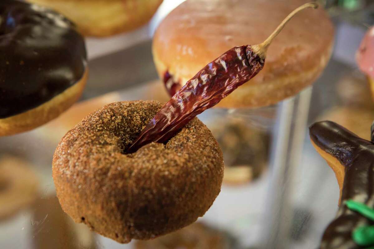 The Ring of Fire doughnut is shown at Voodoo Doughnut on Tuesday, Jan. 7, 2020, in Houston. Voodoo Doughnut opens his first Houston store on Jan. 15.